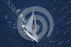 Sailboat In The Peaceful Blue Ocean