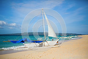 Sailboat on Puka beach, Boracay, Philippines photo