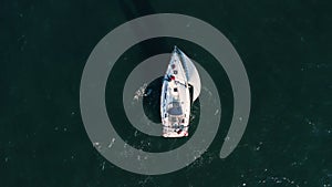 Sailboat regatta under sails at open sea Top view