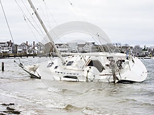 A sailboat run aground after breaking free of its moorings