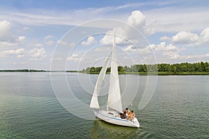 Sailboat sail along the scenic river