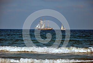Sailboat sailing on blue sea