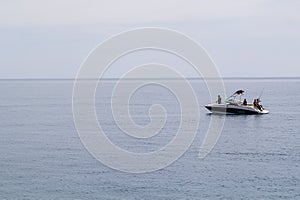 Sailboat sailing in the morning with blue cloudy sky. boat in open waters with beautiful clouds.