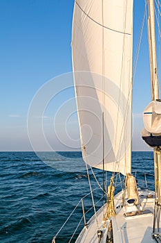 Sailboat sailing on Wadden Sea, Netherlands