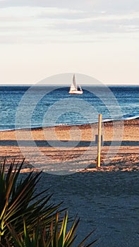 Sailboat on the beach photo