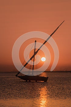 Sailboat and sunset in burullus lake Egypt