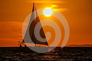 Sailboat-sunset-orange sky