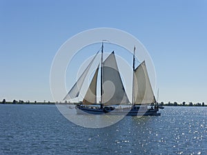 Sailboat taking a trip from Volendam to Marken in North Holland (The Netherlands)