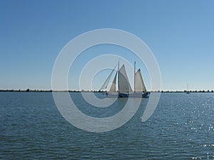 Sailboat taking a trip from Volendam to Marken in North Holland (The Netherlands)