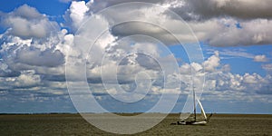 Sailboat under a cloudy sky