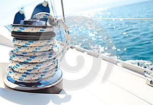 Sailboat winch and rope yacht detail