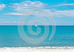 Sailboat yacht sailing sea ocean water on the horizon, summer sport