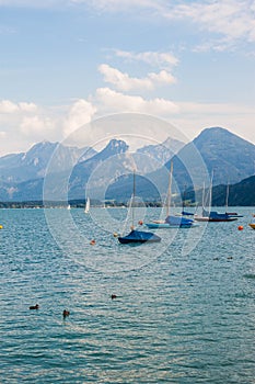 Sailboats on alpine lake Wolfgangsee, Austria