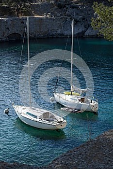 Sailboats anchored in the natural harbour of Port-Miou in southeast France