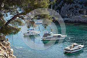 Sailboats anchored in the natural harbour of Port-Miou in southeast France