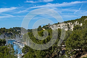 Sailboats anchored in the natural harbour of Port-Miou in southeast France