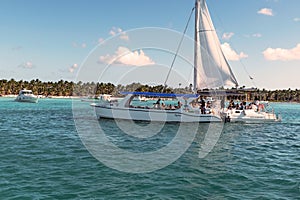 The sailboats in the Caribbean near the coastline of the Saona Island of the Dominican Republic