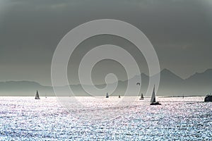 Sailboats and Cies Islands in Galicia at dusk, Spain