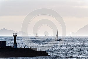 Sailboats and Cies Islands in Galicia at dusk, Spain