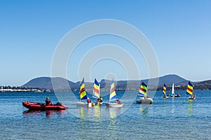 Sailboats on crystal clear blue water