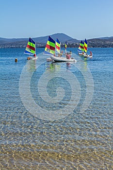 Sailboats on crystal clear blue water