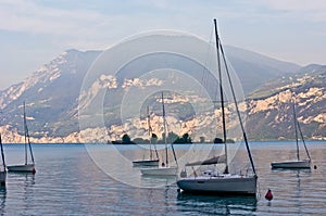 Sailboats on dawn, lake Garda