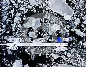 Sailboats in a frozen harbour, aerial view.