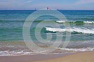 Seascape. Summer, sea, sun, beach, holiday, fun. Sailboats on the horizon - Black Sea, landmark attraction in Romania