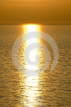Sailboats i hazy sunset photo