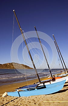 Sailboats Lined up on the Beach