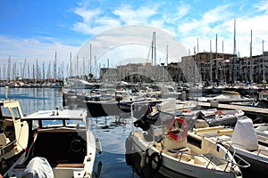 Sailboats moored in the harbor