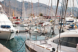 Sailboats, motor boats and yachts at Harbor in Tenerife