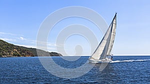Sailboats participate in sailing regatta. photo