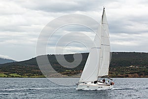 Sailboats participate in sailing regatta 12th Ellada Autumn 2014 among Greek island group in the Aegean SeÃÂ°