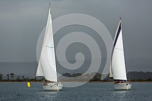 Sailboats participate in sailing regatta 12th Ellada Autumn 2014 among Greek island group