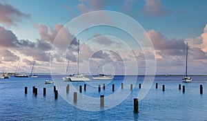 Sailboats Past Pilings in Bonaire