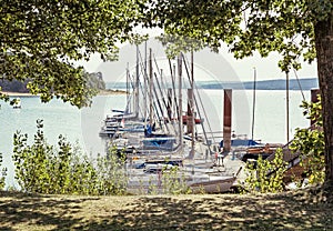 Sailboats at the pier in Brombachsee, Germany photo