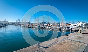 Sailboats & pleasure craft moored. Morning in the harbor of Sant Antoni de Portmany, Ibiza town, Balearic Islands, Spain.