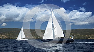 Sailboats in sailing regatta. Sailing. Yachting in cloudy weather.