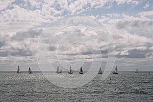 Sailboats Sailing On Sea Against Cloud Sky