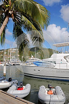 Sailboats and yacht docked