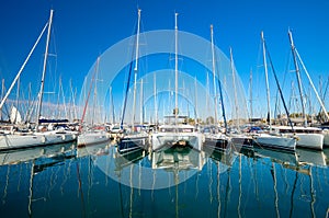Sailboats in Yacht marina. Yacht pier. Many sailing boats are at the pier. Nice trip around the isee