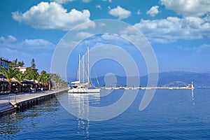 Sailboats and yachts in the harbor seascape Nafplio Greece photo