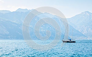 Sailer at water of lake bay photo