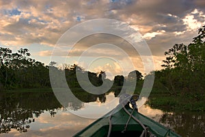 Sailing in the Amazon at sunset