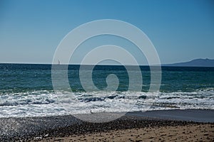 Sailboat view from Camarones Beach photo