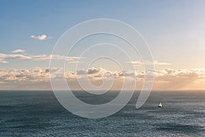 Sailing boat across the sea