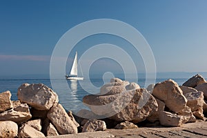 Sailing boat on Adriatic Sea, seen from Piran coast, Slovenia