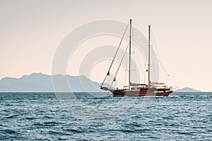 Sailing boat in Aegean sea landscape travel yachting tour cruise