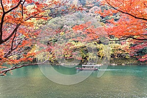 Sailing boat in autumn, Arashiyama, Kyoto, Japan